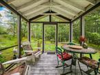 Charming, cozy, and â€˜cute as buttonâ€™ three season cottage in Wurtsboro Hills is straight out of a storybook.  Featured in Metropolitan Home Magazine, this summer getaway is cozy and bright.  One primary bedroom with built in storage makes the most of a smaller space; the bathroom features a fully tiled walk-in shower.  Walk-through kitchen opens into a quaint dining room. The sunroom offers plenty of room for entertaining guests, and its screened porch is a perfect spot for enjoying nature over your morning coffee.  Explore the park-like grounds, just over 3/4 acre, with stone firepit, stone patio, & arbor.  A separate bunkhouse (with electric) on the property offers additional sleeping quarters for guests, a studio space for the artist or handyman, and storage. Property is a three season dwelling, but has the potential to be converted into a year-round residence.  A must-see to appreciate its character and charm!  Less than 2 hours to NYC!