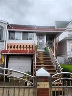 Two Family in the heart of East Flatbush, 3 bedrooms, 2 baths with backyard space. Top floor consists of 2 bedrooms, 1 bath and a front patio. First has 1 bedroom, 1 bath, and living room . Hardwood floors, and lots of windows giving you that natural sunlight. Parking garage, and nice backyard space for you to entertain.