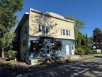 Unlock multiple revenue streams with this unique mixed-use asset in one of the Hudson Valleyâ€™s most dynamic corridors. Perfectly positioned near Gardiner and New Paltz, this income-producing property features a 1, 400 sq. ft. storefrontâ€”currently home to an antique shopâ€”with an additional 636 sq. ft. bonus room, ideal for expanding operations or creating a second retail space, studio, or office.Above and behind the retail space are three well-maintained 1-bedroom apartmentsâ€”two spacious units at approx. 1, 000 sq. ft. and one at 504 sq. ft.â€”providing consistent rental income from day one.Surrounded by the natural attractions of the Shawangunk Ridge, Minnewaska State Park, and Mohonk Preserve, plus proximity to SUNY New Paltz, the location supports strong rental demand and long-term appreciation.Whether youâ€™re looking to expand your portfolio, generate passive income, or tap into the regionâ€™s growing tourism and residential markets, this property checks every box. Zoned for flexibility. Poised for growth. Ready for the right investor.