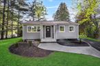 Tucked away on 3.5 acres of park-like property (possibly sub-dividable) in Hopewell Junction, this beautifully updated Ranch-style is cozy yet spacious featuring 3 bedrooms, 2 full baths, bright, open floor plan, and a flexible lower-level with plenty of storage - Perfect opportunity for first-time home buyers or those looking to downsize to one-level living! Convenient municipal water, central air, and a detached garage/workshop with new automatic garage door. Recent updates include a newly black-topped circular driveway, all new plumbing, electrical upgrade, new flooring, freshly painted, all new bathrooms & sunny, bright kitchen with quartz counters and stainless appliances. Nicely set back on Route 82 just minutes from the Taconic Parkway and close to the village, shops, restaurants, and rail trails. The schools are Arlington - Noxon Road Elementary, Union Vale Middle, Arlington High.  Call today and soon you too can enjoy easy living in the beautiful Hudson Valley!