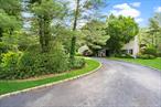 Welcome to 2 Harbor Ct W in desirable Roslyn Harbor. Set on a full acre of private, beautifully landscaped property, this 5-bedroom, 3 full and 2 half bath home offers spacious living and an ideal layout for comfort and entertaining. Features include a formal living room, elegant dining room, large eat-in kitchen, and generously sized bedrooms. The primary suite includes an en-suite bath and ample closet space. Located on a quiet cul-de-sac, this home provides privacy while being close to Roslyn Village, parks, and more. Room for pool. A rare opportunity in a prime North Shore location.