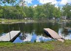 Lakefront paradise 2 hours from NYC set privately in the cove. Motorboat lake. Comes with a 2005 33ft citation with 2 slides in excellentcondition turnkey. Enjoy boating, swimming and kayaking.