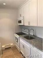 One bedroom top unit in mint condition. Large living room, oversized bedroom, kitchen and dining area full bath