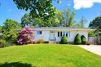 Welcome to 21 Rita Crescent in Commack!This spacious 4-bedroom, 2-bath ranch sits on a .23-acre lot within the Commack School District. The main level features hardwood floors throughout, an eat-in kitchen with gas stove, a formal living and dining room, and a versatile family room or additional bedroom. Three bedrooms and a full bath are located down a private hallway.The full basement includes a large recreation room, home office, laundry area, a second full bath, a hallway with a nook that could function as a second home office or library and a separate side entranceâ€”offering flexibility for a variety of needs. Additional features include central heating and cooling, natural gas service, and an attic for extra storage.Outside, enjoy a generous backyard with a large deck perfect for entertaining, plus a wide grassy area ideal for play, gardening, or relaxing. Conveniently located near the Northern State and Sunken Meadow Parkways, and close to Hoyt Farm Nature Preserve.