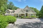 Exceptional and sophisticated Nantucket shingle style Colonial on 3.66 private acres in one of Chappaquaâ€™s most desirable neighborhoods, offers the perfect balance of casual elegance and resort-style living. Just 45 minutes from NYC and minutes to town, train, and top-rated schools, this turnkey home offers unmatched convenience and luxury. Designed for both everyday comfort and effortless entertaining, the property features sophisticated interiors and breathtaking outdoor spacesâ€”creating a true sanctuary for modern family living. From the moment you arrive, youâ€™ll be captivated by the lush, professionally landscaped grounds and impeccable curb appeal. The backyard is a true resort-style retreat, complete with a sparkling pool and spa, a built-in fire pit, an outdoor refrigerator and beverage area, and expansive level lawnsâ€”perfect for entertaining or unwinding in total privacy. Step inside and experience a turnkey masterpiece of design and craftsmanship. The interiors are adorned with high-end finishes, custom millwork, gorgeous hardwood floors and designer touches throughout. The chefâ€™s kitchen is an entertainerâ€™s dream, featuring top-of-the-line Wolf ovens and microwave, a six-burner Wolf range, a separate full size Sub-Zero refrigerator and freezer, dual dishwashers, and sleek, custom cabinetry. Other first floor highlights include a large office, a family room w/walls of windows, a billiard or living room w/ bar and sleek built-ins, and an incredible oversized screened porch w/fireplace and TVâ€”perfect for gatherings and seamless indoor-outdoor entertaining. Upstairs, the primary suite is a luxurious sanctuary, boasting exposed wood beams, a cozy stone fireplace, a spa-like ensuite bath w/ steam shower, and generous walk-in closets. Three additional oversized bedroomsâ€”two sharing a bath and one with its own ensuiteâ€”offer ample space and comfort, all connected by a versatile upstairs lounge area perfect for homework or hanging out. The finished walkout lower level adds even more living space with a media/playroom, a state-of-the-art home gym, a full bath, and access to a covered porch. Additional premium features include a heated three-car garage, whole-house generator, dual laundry rooms, whole house camera security system, and stunning stone walls that frame the propertyâ€™s exceptional landscaping. Meticulously maintained and 100% move-in ready, this one-of-a-kind estate is a rare opportunity to enjoy resort-caliber living in a premier location. Prepare to fall in love!