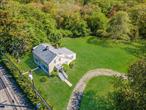 Step into the timeless charm of this historic 1800s farmhouse set on 2.54 acres of scenic conservation land in the coveted North Sea community of Southampton. Located just minutes from Southampton Village and within walking or biking distance to bay beaches, Strongâ€™s Marina, and Big Fresh Pond Recreation Area, this one-of-a-kind property offers the perfect blend of history, nature, and convenience.The farmhouse features 3 bedrooms and 2.5 baths, including two spacious primary suitesâ€”one on each floor. The first-floor suite includes a private entrance, full bath, and large closets. Inside, you&rsquo;ll find a cozy great room, a classic eat-in country kitchen, formal dining room, powder room, laundry room with modern appliances, and a sunroom that opens to a private deckâ€”perfect for entertaining or unwinding in peaceful surroundings.A 2.5-car detached garage/barn provides additional storage or workspace. As a rare bonus, residents enjoy access to a dock slip at a nearby town marinaâ€”ideal for boating enthusiasts.Whether you&rsquo;re seeking a full-time residence, a weekend getaway, or a distinctive investment with strong rental income, in one of the Hamptonsâ€™ most storied and natural settings, 1680 North Sea Road offers a truly special lifestyle.