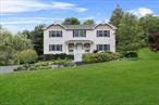 Beautifully maintained Colonial-style home set on 1.5 acres of lush, mature landscaping, complete with an inviting inground poolâ€”perfect for summer enjoyment. A newly installed bluestone walkway leads to the charming front porch, welcoming you into a spacious and sunlit interior with an open-concept layout. The main level features a bright family room with a cozy gas fireplace, seamlessly connected to the eat-in kitchen with Pella sliding glass doors that open to the new deck with Trex railing and backyard oasis. A formal dining room and a separate sitting room provide ideal spaces for entertaining, along with a convenient powder room for guests. Upstairs, the expansive primary suite welcomes you with double-door entry, a walk-in closet, and a spa-inspired en suite bath. Three additional generously sized bedrooms and two full hall baths offer comfort and convenience for family and guests. The lower level offers a full walk-out basement, laundry area, and direct access to the garage. Ideally located near local shops, the scenic rail trail for walking and biking, and a nearby horse farmâ€”offering a perfect blend of convenience and countryside charm. Arlington Central School District