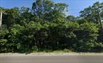.27 / Acre Residential Lot, With Planning Board, & Board Of Health Approvals For A 2 Story Home Featuring A 50&rsquo;x27&rsquo; Foot Print! Beautiful Wooded Corner Location, 100&rsquo;x117&rsquo; +/- In Size! Close To Shopping, Public Transit, & Quick Access To Both Sunrise Highway & The Long Island Expressway!
