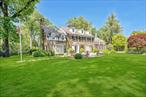 ONE OF A KIND ELDERFIELDS ESTATE! Approx 1.5 Acre Featuring 7, 204 main house interior sq. ft., (not including lower level) Guest Cottage 1, 275 Interior Sq Ft . A true Designer Showcase! This five bedroom, 11 bathroom home w Guest Cottage is a rare gem! This incredible Estate features 20 by 40 gunite pool, tennis court, bocce court, golf putting green and incredible Guest Cottage w. kitchen, 2.5 full baths, and spacious upstairs recreation room w. golf simulator. Award-winning landscaping design w. accent moon lighting throughout this magnificent park-like property. 4 Chesney fireplaces, elevator, generator, automatic electric gate, 4 blue stone patios, outdoor kitchen. Spectacular architectural millwork. 20 Rooms of luxury living. Gracious foyer, formal living rm w. fireplace, formal dining room, gourmet kitchen w LaCornue five burner stove, adjoining breakfast room, butler&rsquo;s pantry room, den/office, sunroom/office, spacious mud room, laundry room and two half baths. Second level features fantastic primary suite w. built-ins w. architectural ceiling and TV, two large his and her walk-in closet rooms and marble spa bath. Upstairs den/sitting room w. custom cabinetry and TV. Additional four bedrooms w. en suite baths. Two staircases to main level. Lower level features unique wood paneled recreation room w. coffered ceiling and custom full service bar, media room/office, fitness room and half bath. The Guest Cottage/Cabana offers a wonderful entertainment space with easy pool access, kitchen and indoor golf simulator to practice your game. This fantastic Estate is truly a permanent vacation with every amenity. Village of Flower Hill, SD #6, Munsey Park Elementary. SEE ATTACHED PROPERTY PROFILE AND SURVEY, Additional information: Appearance:Pristine, ExterioFeatures:Tennis, Interior Features:Guest Quarters, Lr/Dr, Marble Bath, Separate Hotwater Heater:Yes