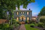 Located in the heart of the historic Village of Goshen, NY, this charming 3-bedroom, 1.5-bathroom colonial blends timeless character with modern comfort. Rich in original details and millwork, the home features a spacious main living level complete with a cozy fireplace in the living room, and a bright, generously sized kitchen that opens into a formal dining roomâ€”ideal for hosting gatherings. Outdoor living is just as inviting, with an expansive covered deck and a screened-in section perfect for relaxing or entertaining in any weather. The beautifully manicured and fully fenced .17-acre lot is adorned with lush gardens and mature trees, creating a serene oasis. Just minutes away from Goshenâ€™s vibrant downtown, residents enjoy easy access to local shops, dining, farmers markets, parks, the Heritage Trail, and top-rated schools. Commuters will also appreciate the proximity to major highways and public transit options, making this a truly special place to call home.