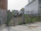 Subject is a vacant lot for sale as is.