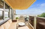 Wake up to stunning water views in this beautifully renovated 2-bedroom, 2-bath home in the pet-friendly Americana building at the Towers at Waterâ€™s Edge. Originally a 3-bedroom, this thoughtfully redesigned layout offers expanded living and dining areasâ€”perfect for modern living and effortless entertaining. The sunlit chefâ€™s kitchen features sleek cabinetry, quartzite countertops, a wall-mounted pot filler, Wolf oven range, Bosch dishwasher, Liebherr refrigerator, and a built-in wine fridge. Porcelain floors flow through the kitchen and dining area, while engineered hardwood adds warmth to the living room and both bedrooms. The tranquil primary suite includes a private terrace, custom closet systems, and a spa-like en-suite bath. The second bedroom offers custom-built-ins, and the second bathroom offers a jetted tub, making it ideal for guests. Enjoy two private terraces with panoramic views of Little Neck Bayâ€”perfect for morning coffee or evening unwinding. Oversized windows throughout the home fill the space with natural light and highlight the elegant finishes throughout. Residents enjoy a full-service lifestyle with amenities including a 24-hour doorman, fitness center, seasonal heated pool, pickleball courts, tennis courts, on-site convenience store, beauty parlor, dry cleaners, and garage and lot parking options. Located just minutes from shops, dining, and public transit. This is more than a homeâ€”itâ€™s a rare opportunity to live the waterfront lifestyle.