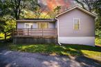 Discover the perfect blend of comfort and seclusion in this charming 3- bedroom, 2-bath ranch, ideally set on a private, wooded lot with a picturesque pond. This home welcomes you with an open and airy floor plan, featuring a spacious living area filled with natural light and views of the surrounding landscape. Whether you&rsquo;re looking for a year-round residence or a serene weekend retreat, this property offers unmatched privacy and natural beauty- all just minutes from local dining, shopping, and amenities- located one mile from the Village of Red Hook.