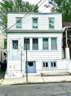 Attention Investors & Homebuyers!Opportunity knocks with this charming two-family zoned home, ready for your vision and TLC. Nestled in the heart of the village, this property offers unmatched potential for those seeking a fantastic investment or a place to call home.Enjoy the convenience of nearby schools, parks, and shops, making everyday living a breeze. Whether you&rsquo;re looking to renovate and customize or capitalize on its prime location and multi-family zoning, this is an opportunity you donâ€™t want to miss!