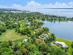 Rare opportunity to build your dream home on almost 1 acre in Premium Point; a gated, water-front community in lower Westchester. At the end of the half-mile long drive you are greeted by a 24-hour guardhouse and wrought iron gates that provide you with a sense of the exclusivity and privacy that this small enclave offers residents. The area consists of a series of small islands connected by bridges to a peninsula fronting on the Long Island Sound and backing onto Premium Mill Pond and Echo Bay. Residents enjoy a community dock where you can launch your kayak or paddle board for a day on the water or relax as you watch the sun go down. Situated just 10 minutes from the Larchmont Metro North Station, picturesque downtown Larchmont, and vibrant New Rochelle. Images show approximate location of the land and should not be taken as exact boundaries. Survey attached to MLS listing.