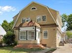 FHA & Conventional loans welcome â€“ Stunning Renovated Colonial near Garden City. This spacious home offers approx. 2, 000 sq. ft. of living space on a 4, 242 sq. ft. lot. The first floor features a welcoming entrance, living room with fireplace, dining room, updated kitchen with marble countertops, 3 separate entrances, and a half bath. Upstairs includes 4 bedrooms, a full bath, and a flexible-use space. The finished basement with private entrance offers a bar counter, cabinets, and central air conditioning, making it ideal for entertaining or recreation. An unfinished attic provides additional storage or future potential. Exterior highlights include a private driveway for 2 cars, a 2-car garage, and a large detached storage room (4 parking spaces total). Quiet residential setting close to shopping, medical, parks, recreation, and highly regarded schools. This property represents one of the best-priced opportunities for a renovated and spacious home near Garden City.