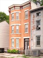 Welcome to Liberty Street in downtown Newburgh New York! This two unit apartment building has been wonderfully renovated and furnished, and is perfect for a new neighbor or investor. Currently both units are used as successful short-term rental apartments. It will be easy to either move in or keep renting over the long or short-term!On the first floor is a one-bedroom apartment with access to a large deck. Historical details like trims and fireplaces have been preserved, and a modern kitchen and bathroom make it move-in or lease-up ready.Upstairs is a charming two-story apartment with kitchen, living room, dining room, and full bath on the first level. The top level of the home has another full bath and three well-sized bedrooms.The walk out basement is semi-finished with a new concrete slab and ample space for storage and laundry. While the building has been totally modernized with contemporary plumbing and electric throughout the home, historical trims, fireplaces, and floors have been preserved. This is a lovely, inviting home on a block with fantastic neighbors and businesses. We can&rsquo;t wait to welcome you to Newburgh!