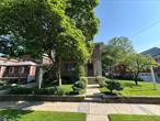 This is a beautiful home nestled on a tree lined street in the heart of North Flushing. It is located just three short blocks from Bowne Park. The front, side and backyard landscaping has been tastefully designed and laid out...watered by an 8 zone sprinkler system. There is a wide variety of trees, bushes, shrubs, flowers and a grape vine. At the center of the backyard is a pond. The pond has a filtration system and a circulating pump with a three drop waterfall. This house is located 3 blocks from a major bus route which can bring you to the LIRR or #7 train within minutes.
