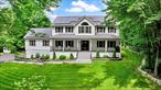 Welcome to this beautiful 4-bedroom Colonial nestled on 5.5 serene acres with seasonal views, offering the perfect blend of privacy, charm, and modern convenience. A long, paved driveway (2022) that offers generous parking and guides you through a professionally landscaped approach, beautifully accented with natural bluestone and ambient dusk-to-dawn sensor lighting. The inviting Trex rocking chair front porch and striking new Pella front door/windows (2019) create a memorable first impression, giving you a glimpse of the comfort and style inside. Step into the inviting foyer with new tile flooring (2025) and continue into the heart of the home- a fully renovated kitchen featuring granite countertops, a center island with bar seating, abundant cabinetry, and a stylish backsplash. Sliding glass doors (2019) open to a spacious Trex deck with solar caps and a retractable awning with dimmable lights(2021) ideal for entertaining or enjoying peaceful outdoor moments as you relax in your above-ground oxygen pool. The open-concept flow between the kitchen and the living room, complete with a classic wood-burning fireplace, makes hosting effortless. A formal dining room with gleaming wood floors offers space for memorable gatherings, while a separate front room is perfect for a home office or guest room. Just down the hall from the kitchen leads to a versatile bonus room equipped with a ductless heating and cooling system (2021), new flooring (2025)â€”ideal for extended family, a playroom, or a private work-from-home space/business, which connects with the lower level basement area that is partially finished. The upper level boasts a generously sized primary suite with tray ceilings, a spa-like en-suite with a Jacuzzi tub, and a walk-in closet. It also features three generously sized bedrooms with ceiling fans and plush carpeting, as well as a full hall bath. Resorts World Catskill Casino, Kartrite Indoor Water Park, Legoland, Sam&rsquo;s Point Hiking, Minnewaska, Mohonk Mountain House, Angry Orchard, Restaurants, Breweries, Wineries and more! Within 1.5 to NYC