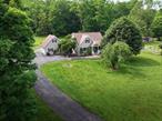 Cape Cod-style home nestled on a spacious 2-acre lot , offering the perfect combination of space, comfort, and character. This well-designed residence features three generous bedrooms, two full bathrooms, and an additional half bath. Enjoy relaxing mornings or evening unwinding on the inviting open and covered porches.The full basement provides abundant storage or potential for a personalized workspace. Exterior highlights include vinyl siding and beautifully landscaped grounds, perfect for outdoor activities and entertaining. The property also boasts a lovely fire pit area with seatingâ€”great for gatherings or quiet evenings under the stars.Located in the desirable Pine Bush School District, this home offers convenient access to shopping, major roads, and recreational areas, making it an excellent choice for those seeking both tranquility and accessibility. Nearby amenities include local grocery stores, cafes, and restaurants. Outdoor enthusiasts will enjoy proximity to parks, hiking trails, and the scenic Catskill Mountains. Healthcare facilities, community events, farmers&rsquo; markets, and seasonal festivals are all within easy reach.
