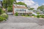 Enjoy unobstructed panoramic water views from this updated home which includes a legal two-bedroom accessory apartment. Located on a quiet street high above Long Island Sound, the home has a wraparound deck with views from several angles. There is also a private rear yard providing space for outdoor dining and entertaining. The light-filled interior features all Andersen windows, a living room with custom cathedral ceiling, updated eat-in kitchen with brand-new stainless steel appliances and quartz counters. Also on this level is a guest bedroom/office and full bath with jetted tub. Stairs leading to the balcony and primary bedroom have wainscoting on the walls. The primary bedroom features water views, a skylight, and an updated bath with designer touches and a new shower. Also on this level is a walk-in closet that was originally a bedroom with a window and additional storage space. On the first level is the accessory apartment, which features a separate entrance, a living room, a galley kitchen, a full bathroom, and two bedrooms. Among the updates are new siding (2024), heating system (2023), roof (2017), weather-sealed stormproof Andersen windows, and upgraded electric system. Minutes away is a private North Shore Beach which completes your perfect weekend retreat or year-round home. Your opportunity to experience coastal living!