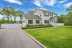 Nestled on a sprawling 0.95-acre lot, this beautiful 4-bedroom, 2.5-bath colonial-style home exudes classic charm and modern comfort. With a spacious 2, 038 square feet of living space and an attached 2-car garage, the inviting front porch, well-maintained landscaping, and expansive green lawn create a serene and picturesque setting perfect for relaxing or entertaining. Ideally located close to shopping centers and a vineyard, this home offers the perfect blend of convenience and tranquility.