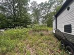 Raw piece of land on a residential road. Not engineered.