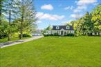 Welcome to this picturesque 4-bedroom, 2-bath Cape Cod-style home, offering the perfect blend of classic charm and modern comfort. Nestled on just under 2 acres of serene land, this property is a relaxing escape from the everyday hustle, yet conveniently located near all amenities. Step inside to discover an inviting main floor, featuring a cozy bedroom currently being used as a playroom, a sun-filled open kitchen complete with a brand new top-of-the-line THOR stove, and a spacious dining area perfect for hosting gatherings. The adjacent sunroom provides a seamless transition to both the front and back decks, creating an indoor-outdoor living experience thatâ€™s ideal for entertaining. The expansive back deck, equipped with a fireplace, offers a cozy spot to enjoy peaceful evenings. Downstairs, a full basement with a fireplace presents endless possibilities â€“ whether you envision a home theater, gym, or family game room, this space is ready to be transformed to fit your needs. Outside, you&rsquo;ll find a detached 3-car garage with expansive driveway with at can fit 10+ cars: above your garage is unfinished storage space. This area offers potential to be converted into a guest suite, home office, or studio, adding even more value to this already spectacular property. Additional Information: Heating Fuel: Oil Below Ground, Parking Features: 3 Car Detached. **More pictures to come.