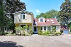 Welcome to this spacious and sun-filled 4-bedroom, 3.5-bath home set on 1.75 acres of flat, park-like property in the heart of Woodbury, within the top-rated Syosset School District.The home&rsquo;s generous layout is designed for both comfort and possibility, featuring a warm and inviting living room with a classic wood-burning fireplace and a den surrounded by windows that frame peaceful backyard views. It also includes a walkout basement, offering flexible space for recreation, a home office, or multigenerational living. While some updates may be desired to align with your personal style, the home is move-in readyâ€”allowing you to enjoy it now while planning your dream design at your own pace. Step outside to a large covered porchâ€”perfect for relaxing, entertaining, or simply enjoying the serenity of your private landscape.  Whether you&rsquo;re seeking a tranquil retreat, a place to grow, or a canvas to create your ideal living environment, this property offers rare value in a prestigious location. Come experience the space, setting, and spirit of possibility that only a property like this can provide.
