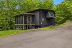 Discover a one-of-a-kind retreat at 66 Hill Road, a character-rich home nestled on 1.7 acres in Kingston, NY. Built in 1980, this 2-bedroom, 1-bath residence offers approximately 1, 680 sq ft of living space, blending rustic charm with modern comfort.Inside, you&rsquo;ll find spacious living areas with three bedrooms and a full bath, providing ample space for family and guests. The finished walk-out lower level adds versatility for a home office, studio, or additional living area. Wood siding and a welcoming open porch enhance the home&rsquo;s unique appeal, while forced air heating with oil fuel ensures year-round comfort. The 1.7-acre lot offers serene outdoor space perfect for gardening, recreation, or simply enjoying nature.Located in the vibrant city of Kingston, this home offers easy access to a blend of historic charm and modern amenities. Explore the nearby Stockade District with its 17th-century architecture, or enjoy the arts, culture, and dining scene in the Rondoutâ€“West Strand Historic District. Kingstonâ€™s diverse neighborhoods provide a rich cultural experience, from bustling farmers markets and music venues to tranquil parks and riverfront activities.Embrace the opportunity to own a distinctive home that combines character, space, and a prime location. Whether you&rsquo;re seeking a peaceful retreat or a base to explore the Hudson Valley, 66 Hill Road is ready to welcome you.