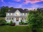 Set high above the landscape with sweeping views and breathtaking sunrises, this beautifully updated colonial-style home offers over 2.5 acres of peace, privacy, and modern comfort. From the moment you arrive, the charm of the front porch and tranquil surroundings welcome you home. Step inside to discover a bright, open layout featuring high ceilings, rich hardwood floors, elegant crown molding, and a striking retractable chandelier in the two-story foyer. The inviting living area centers around a cozy gas fireplace, perfect for relaxing or entertaining. The kitchen, updated just three years ago, is a showstopper â€” complete with sleek stainless-steel appliances, white cabinetry, a stone center island, and granite countertops. The adjoining breakfast nook opens directly to your private outdoor oasis. The main level also includes a conveniently located laundry room just off the garage, making everyday living effortless. Upstairs, the spacious primary suite offers a spa-like en-suite bath with a tiled stand-up shower, soaking tub, and a large custom walk-in closet. Three of the four bedrooms include their own en-suite bathrooms, and thereâ€™s an additional half bath on the second level â€” ideal for accommodating guests or family members seeking privacy. Step outside and fall in love with the resort-style backyard. A heated, gunite saltwater pool is the centerpiece of the expansive patio â€” ideal for summer BBQs, sunbathing, or simply unwinding. Enjoy shaded hammock afternoons, a fenced-in basketball/sports court, and a level open lawn â€” perfect for football, soccer, or hosting outdoor events. Youâ€™ll also have direct access to the scenic Putnam Trailway for walking, jogging, and biking. Additional highlights include: Irrigation system for easy landscaping maintenance, 2-car attached garage with race deck flooring and a car lift, Automatic generator for peace of mind, Two brand-new A/C condensers. This home is truly turn-key and ready for its next chapter. Come see all that 646 Route 311 has to offer â€” space, style, and the perfect setting to live, work, and play.