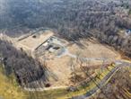 Spectacular private building site on 22 acres with amazing views!! own water, septic installed and approved, electric and driveway installed, Natural gas and site plan approved for a 5 bedroom home with an auxiliary garage. Five-bedroom board of health approval in place, building site cleared, new survey in-hand... submit your building plans and start construction of your dream home. Foundation in place and a tremendous amount of site work completed. Plenty of room for pool, garage, barns, gardens, etc..