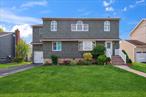 Welcome Home To This Spacious Expanded Ranch In Massapequa Park. Featuring 5 Bedrooms And 2 Full Baths, This Home Offers A Great Layout For Everyone!! The Main Level Features A Living Room, Dining Room, Kitchen, Two Bedrooms And A Full Bathroom. Second Floor,  Three Additional Bedrooms, Living Room And A Second Full Bath-Ideal For Guests, Home Office. A Full Finished Basement With Lots Of Storage. Above Ground Pool. Two Electric Meters Set Up As A Mother Daughter.
