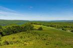This is a rare opportunity to own one of 22 properties in South Hill, a carefully planned community where modern design meets natural beauty, offering residents the chance to live in harmony with nature while being part of the vibrant surrounding communities. This stunning 3.59-acre lot commands panoramic Hudson Valley views encompassing rolling mountains, pristine water, and open meadowsâ€”offering the perfect canvas for your dream home with unobstructed vistas that stretch for miles. South Hill is an exclusive community of 22 architect-designed modern homes thoughtfully spread across 131 bucolic acres on a ridge in Wawarsing, Southern Ulster County. This unique location sits at the crossroads of the Catskills and Hudson Valley, immersed in the rich landscape of the Catskill and Shawangunk Mountains. Residents enjoy shared access to the 30-acre community meadow, a community barn, and spectacular views of the Rondout Reservoir along with the surrounding mountain ranges. South Hill offers the perfect balance of seclusion and connectivity. Less than two hours from New York City, this premier subdivision provides an ideal setting for weekend getaways, four-season adventures, or full-time living. Close to many of the Catskill region&rsquo;s hotspots from Livingston Manor to Woodstock, South Hill is one of the few remaining areas in the region that feels truly remote. A full brochure is available upon request.