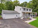 Such a peaceful setting for this immaculate 4 BR, 2.5 bath Colonial in the heart of The Minisink School District. This home is a dream for pet owners! The fenced backyard keeps your pets safe and secure while they play, and the underground dog fence lets them roam worry-free. There is a woodstove that is perfect for chilly evenings that will help with your heating costs during the cold winter months, a rear deck and firepit for family parties in the summer and a cozy front Trex porch for drinking your morning coffee. This beautifully landscaped, level lot with a garden area is protected from behind by farmland that ensures privacy and tranquility. With multiple sheds and a workshop you are more than covered for storage of your lawn care items and gardening needs. The partially finished basement adds versatile space for a home office, gym, or playroom. Perfectly located for both convenience and adventure, you&rsquo;re just minutes from major highways and only 1 hour to NYC. Just a short drive to Legoland, The Kartrite Resort, Resorts World Catskill, local breweries, wineries, and scenic trails.
