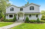 Fabulous Strongs Neck waterfront colonial set on 1.5 private acres with over 200 feet of shoreline and sweeping western views of Little Bay. This fully renovated, custom-built home offers three levels of breathtaking water views and exquisite millwork throughout, including hardwood floors, wainscoting, crown molding, vaulted ceilings, and arched windows and doorways.The spacious chefâ€™s kitchen features granite countertops, stainless steel appliances, a walk-in pantry, built-in microwave, oven warming drawer, and a sunlit dining area with spectacular water views and sliders to an expansive deckâ€”ideal for alfresco dining and sunset gatherings. The primary suite includes a walk-in closet with built-in shelving, a luxurious bath with Whirlpool jacuzzi, and a private balcony with panoramic bay views. Work from home in a stunning office with a separate entrance, vaulted ceiling, gas-heated fireplace, and picturesque water viewsâ€”perfect for productivity and inspiration. A finished walkout basement with water views and separate heat/cooling zones provide versatile living or entertaining space.Situated on a quiet cul-de-sac, the property features a level, sprawling lawn, stone tiered garden beds, in-ground sprinklers, and an additional storage garage. Kayak or paddleboard from your own backyard. Located in the Three Village School District, the home is conveniently close to Frank Melville Park, West Meadow Beach, and the Stony Brook train station. Beach rights with a boat ramp complete this exceptional coastal retreat! Beach association dues are $150/year.