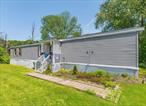 Discover comfort and convenience in this well-maintained 3-bedroom, 2-bathroom +bonus room, mobile home with a fenced in rear yard. Located in the highly sought-after Monroe School District. This home offers a spacious and open layout, perfect for modern living. The primary suite features an en-suite bathroom for added privacy, while the additional bedrooms provide ample space for family, guests, or a home office. Situated in a prime location, this home is conveniently located near major highways, making commuting a breeze. Enjoy shopping at the renowned Woodbury Commons Outlets, as well as a variety of nearby restaurants and entertainment options. Donâ€™t miss the opportunity to own this affordable, move-in-ready home in a fantastic location!