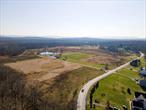 Welcome to Robinson Lane! This exceptional agricultural property offers a remarkable opportunity to own 99 acres of land that has been utilized as a thriving blueberry farm in the past. Offers nearly 2, 000 ft of road frontage on Robinson Lane. Comprises three separate parcels, each presenting its own unique features and possibilities. As you enter this expansive property, you&rsquo;ll be captivated by the lush greenery and breathtaking landscape that surrounds you. The land boasts generous road frontage on Robinson Lane, ensuring easy access for transportation and enhancing its commercial potential. Numerous mature blueberry bushes scattered across the land. These well-established bushes provide a head start for anyone looking to continue the blueberry farming tradition or explore other agricultural ventures. Whether you&rsquo;re an experienced farmer or an aspiring one, this land holds incredible potential for growth and profitability. Whether you&rsquo;re seeking a new business venture or a tranquil retreat away from the hustle and bustle of city life, this property provides the perfect setting. Conveniently situated near main roads, this property offers easy access to neighboring towns, markets, and other essential amenities. It strikes an ideal balance between seclusion and accessibility, providing the best of both worlds.