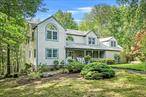 This gorgeous home sits beautifully amid ornamental gardens, professionally designed to create a private & serene oasis. Enjoy the changing colors of blooming flowers and specimen trees while strolling gravel pathways or viewing from the covered front porch while enjoying morning coffee or an afternoon cocktail. Upon entering this home you will immediately sense how meticulous the owners have maintained and cared for their home. The remodel kitchen will impress the most discerning buyer. The formal living room w/French door flows to a spacious family room w/gas fplc & door out to large deck overlooking private back yard. Many new & recent upgrades include remodeled kitchen (2015), replace furnace (2017), new H2O heater (2012) & replaced roof (2009), and LED lighting. Master bedroom has high ceilings, sitting area & walk in closet. Spacious 4th bedroom has built-in shelving w/high ceilings perfect for office or 2nd floor playroom. Huge unfinished basement, dry, high ceilings, with walk out door to side yard. Two car garage. Located just minutes to all Somers School campuses. and 5 minutes to Reis Park. Star exemption $1, 586.