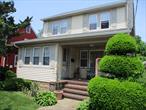 walk to schools, the LIRR, shops, and parkways. Quiet block, full basement, attic, 2 car garage, long driveway.