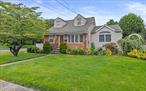 Located within the highly sought-after East Williston School District, this beautifully maintained Cape Cod Style home showcases a wonderful curb appeal and offers outstanding comfort and functionality. Set on an oversized, fully fenced and tastefully landscaped corner lot, this property is a perfect blend of private and convenient living. Step inside to a versatile layout that features dedicated dining room, den, vaulted living room and eat-in kitchen. Three generous-sized bedrooms, two full bathrooms, and a spacious layout. The property has a wonderful potential for mother/daughter setup with proper permits. A full basement provides ample storage and recreational space. Natural Gas heating and cooking. Enjoy close proximity to the LIRR for a quick and easy commute, all while being nestled in a quiet residential neighborhood known for its charm and award winning schools. This is a rare opportunity to own a move-in ready home in a prime location with incredible flexibility and potential.
