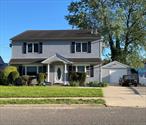 Welcome To 74 Old Farm Rd. This Beautifully Colonial Home Boasts 6 Bedrooms, 2 Full Bathrooms. The Home Features Erik W/Granite Countertops, Cherry wood Cabinets, Hardwood Floors Throughout. The First Floor features a Living Room, Dining Room, Full Bath and 2 Bedrooms. - Continued on the 2nd Floor, You Will Find 1 Oversized Bedroom and 3 Large Additional Bedrooms,  Full Bath and Laundry Room. 1 Car Detached Garage. Ideal For Extended Family. Don&rsquo;t Miss This Opportunity! Sold As Is