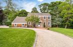 Welcome to your private retreat in Wading River! Tucked away in a cul-de-sac on a beautifully landscaped shy acre lot, this cedar-shake, center-hall colonial offers the perfect blend of classic elegance and modern comfort, complete with an in-ground pool, hot tub, and expansive living space designed for both relaxation and entertaining.Step inside to discover a timeless center hall layout that blends traditional charm with comfortable, everyday living. The formal living room offers a welcoming space for more elegant gatherings, while the elegant dining room sets the stage for memorable holidays and special occasions. At the heart of the home is the spacious and inviting family room, featuring a wood-burning fireplace that adds warmth and character. The updated kitchen is thoughtfully designed with ample cabinetry, generous counter space with stone tops, and high-quality appliances, making both cooking and entertaining a pleasure. The seamless flow between the kitchen, dining, and den creates an easy, connected lifestyle. Upstairs, youâ€™ll find four generously sized bedrooms, each with ample closet space. The primary suite features a walk-in closet and an updated bathroom, while another updated bath is in the hall.The lower level offers an extended living space, including a spacious recreation room. Additional finished areas provide flexibility for a guest suite, office, or potential income-generating space. With a separate outside entrance and dedicated utility area, this level adds both functionality and potential for multigenerational living or work-from-home setups.Step outside to your personal retreat. Professionally landscaped grounds surround the fenced, in-ground pool. Hot tub and extended patio area offer ultimate privacy for summer fun. A spacious two-car garage provides ample storage and convenient direct access to the home.This exceptional property offers the serenity of a quiet location with convenient access to beaches, vineyards, dining, and all that the North Fork and surrounding area have to offer. Peconic Tax applicable. Donâ€™t miss the chance to make this special Wading River gem your forever home!