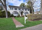 Magnificent Colonial on a Level corner lot Features Split living with the same on Left side and Right sides of house: first floor - Hardwood floors in Living rm with bay window and lots of natural light Formal Dining Rm, Kitchen with Energy Star Appliances , Gas stove & with plenty of cabinets and counterspace, powder room, 2nd floor 2 bedroom and a full bath and office/utility closets . Full finished basement with Laundry with washer and dryer on both sides , Detached 2 car Garage on a large fenced property with a Patio & with a shed. 4 heating zones separate water heater, insulated doors and programmable thermostat, Possible Mother/daughter w/proper permits.