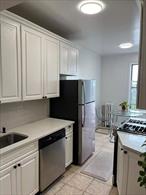 Great location! Beautiful one bedroom Condo located in the 6th Floor, Elevator, low maintenance, common charge is only $368.57/ month. One bedroom condo has been divided into 2 bedroom. 852SF interior size. Move in condition. Must see!
