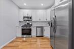 Looking for a mother/daughter? Look no further! Come explore all the possibilities of 217-39-114th Road!A Turn key move in ready brick mother/daughter nestled on a beautiful tree lined street of Cambria Heights!1st floor - expansive sun drenched living/dining area, beautiful chefs granite kitchen equipped with floor to ceiling custom cabinetry and a full fleet of stainless steel appliances. 3 spacious bedrooms equipped with ample closet space & a fully tiled bathroom adorned with state of the art wall & floor tiles. Lower unit - designated laundry room for homeowner, 2 bedroom, 1 bath in-law suite. Renovations include brand new hardwood flooring, recessed lighting, updated electrical, heating and plumbing systems throughout.Prime Cambria Heights location. Just off Springfield Blvd, Murcock Avenue, Francis Lewis Blvd. Short blocks to Cross island parkway, UBS Arena, JFK Airport, schools, shopping centers, restaurants, cafes, parks and many other vibrant neighborhood amenities.