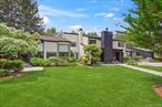 A stunning example of a custom designed home to enhance daily life with an open concept floor plan of primary living spaces and truly magazine worthy. Located in prestigious Oyster Bay Estates (Syosset School District) this home has been redesigned and renovated with primary suites on the main level and second floor. Step into the grand two-story atrium foyer that sets the tone for over 5617 square feet of elegant living space plus 2000 square-foot finished basement with high ceilings. First floor features an oversized primary suite with ensuite office and fireplace, loft suitable for a gym or media room, a 3-room primary bath with two large, walk-in outfitted closets. The first-floor main principle spaces have floor to ceiling windows and sliding doors overlooking magnificent park-like property. Additional main level bedroom or office, full bath, laundry room and access to 3 car garage equipped with new doors, new operators, and new floor, Formal dining room features a wall of glass windows, family room detailed with wet-bar and two sets of sliders flanking the fireplace. Brand new eat-in kitchen with high-end chefâ€™s appliances., gas cooking, sliders to yard, and two-tier quartz counter tops, perfect for entertaining. Second level features 4 large bedrooms, and 2 additional bathrooms, one ensuite, main and secondary staircases and balcony overlooking principle main level living spaces. Lower level is tastefully finished with high ceilings, full bath, second kitchenette, storage and walk-in closets. Outside rear property is an oasis with gunite heated pool, bluestone patio, built-in BBQ with Lynx grill and granite surround, Har Tru tennis court with lights, perennial plantings all situated in a private bucolic 2 acre setting. 4 zone natural gas heat, 4 zone central air conditioning, central vac, 18-zone sprinkler system, gas generator, and state of the art security system. Community HOA includes snow removal, community beautification and 24/7 manned security camera. Sanitation pick up is included in village taxes.