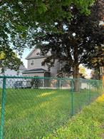 Settle into the charm of Orange County, NY, in this bright and airy three-bedroom home. The kitchen features elegant white cabinets and stainless steel appliances, perfectly combining style and functionality. Additional conveniences include a laundry room, mudroom, walk-up attic, and a full basement for ample storage. Situated on a corner lot, this property boasts a fenced-in backyard with plenty of space for your family. The enclosed front porch and small deck open up to a spacious, level yard, complemented by a shed and abundant off-street parking. Experience it firsthand and seize this opportunity! Commuter friendly an added bonus!