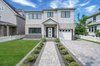 Welcome to this stunning 3-year-old Modern Colonial, perfectly blending timeless elegance with contemporary style. This beautifully maintained home features 5 spacious bedrooms and 3.5 luxurious bathrooms, offering exceptional living space for today&rsquo;s lifestyle.Step into the open-concept first floor, where the living room, dining room, and eat-in kitchen flow seamlessly for effortless entertaining and everyday living. The den is enhanced with sliding glass doors that lead to a large stone patio, ideal for outdoor gatherings, and overlooks a spacious, fully fenced backyard.The modern, sleek kitchen is a true showpiece, equipped with high-end cabinetry, stainless steel appliances, and granite countertops. The first floor features 9-foot ceilings, recessed lighting (hi-hats), custom moldings, and heated marble floors for added comfort and luxury.Upstairs, the second floor offers four additional bedrooms and a grand primary suite complete with a spa-like en-suite bath and an expansive walk-in closet. Beautiful wood floors, 4-panel doors, recessed lighting, and custom moldings continue throughout, along with a custom railing accenting the stairway and landing.Additional highlights include a full unfinished basement with 9-foot ceilings and an outside entrance, offering endless possibilities for future customization. Exterior features such as Central Air Conditioning, a stone driveway, and durable vinyl and stone siding add to the home&rsquo;s value and curb appeal.This exceptional property is the perfect combination of style, function, and comfortâ€”ready to welcome you home.