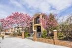 Welcome to this stunning, all-brick legal two-family corner home, rebuilt in 2013 and nestled in the heart of Flushing. Perfect for large families or savvy investors, this property boasts a generous lot size and a well-designed layout.The first floor impresses with an open-concept design and soaring high ceilings, creating a grand and inviting atmosphere. This elegant home features five spacious bedrooms and four and a half beautifully designed bathrooms, exuding modern sophistication. The gourmet kitchen is a chefâ€™s dream, equipped with top-of-the-line appliances, ample cabinetry, and sleek granite countertops.Upstairs, the master suite is a private retreat, complete with an ensuite bath, a spacious walk-in closet, and a private balcony. This level also includes two additional bedrooms and a full bathroom. The finished basement offers additional living space, featuring a full bathroom and a separate entrance leading to the yard. A detached two-car garage and an extra-long driveway provide parking for at least three additional vehicles. The second family unit includes two bedrooms, one bathroom, a living room, and a kitchenâ€”completely move-in ready. Whether you choose to rent it out or occupy it yourself, this home promises strong long-term appreciation. Adding to its charm, the owner has thoughtfully designed a private front yard garden complete with a tranquil fish pond, creating a serene escape in the heart of the Flushing. Conveniently located just minutes from Queens College and local supermarkets, this home provides easy access to major highways, including I-495 and I-678, ensuring a seamless commute. Enjoy the vibrant energy of downtown Flushing, with its diverse dining, shopping, and entertainment options, all just a short 10-minute drive away.Donâ€™t miss this opportunity to own an exceptional home in one of Flushingâ€™s most desirable locations!